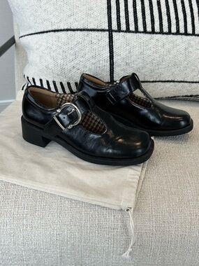 Call It Spring Black T-Strap Mary Jane Flats with Silver Buckle